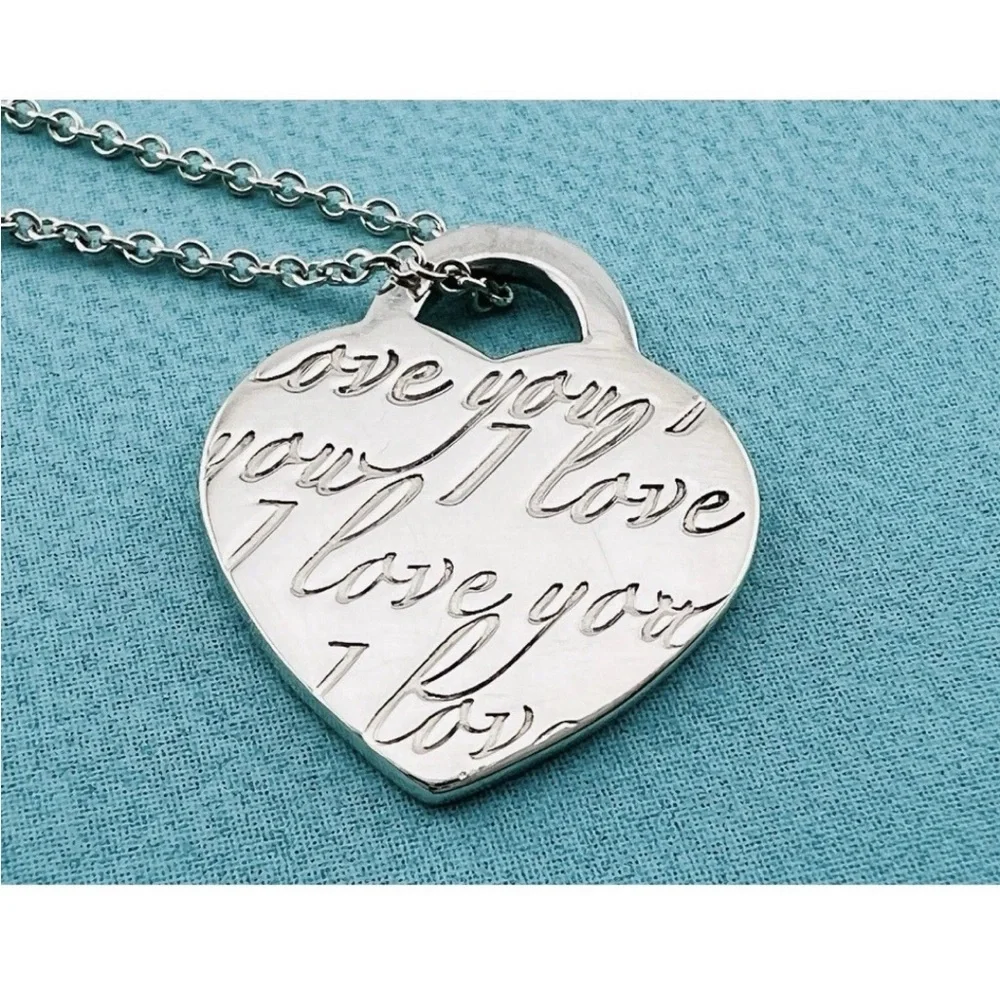 Tiffany & Co 💯% Auth ‘I Love You’ Notes Engraved Heart Necklace🩵 w/Pouch 🩵 - Picture 2 of 5
